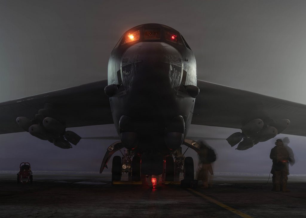 A sinister dark pic of a B52 on the runway